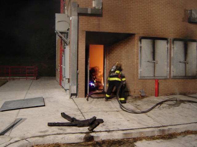 MCFA Live Burn 04/06 - The hose team advances on the fire